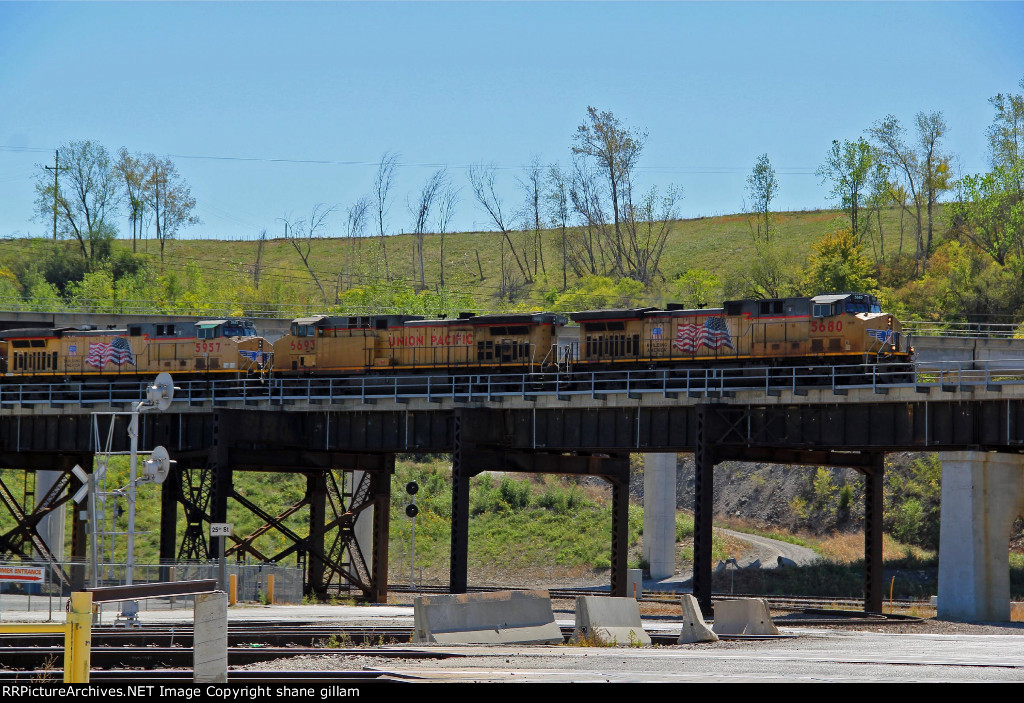 UP 5680 leads a Wb coal empty Over Santa Fe Junction.